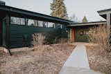 Although wintertime conditions mean the landscaping is yet to come, a new exterior paint job gives the home a rejuvenated look.