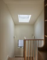 The stairwell landing, with new oak bannister and added skylight