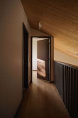 For the upstairs bedroom, pub-grade wood flooring was chosen, which helped reduce cost.