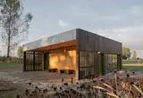 The mural was improvised by Jessica and Dan after they ran out of Arbor Wood cladding, but architect Annabell Ren had encouraged them to incorporate Jessica's art into the project.