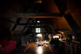 Scott Schultz at work in his mezanine studio.