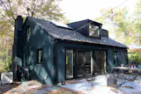 The renovation added two sliding-glass doors and a new concrete patio.