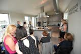 Monogram Modern Home Tour Houston stop 2016 - Chef John of Monogram talking to a CEU class about the 10 luxury Monogram appliances in the home - most of which are paneled with custom cabinetry from Smith & Vallee. 