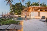 Outdoor, Stone Patio, Porch, Deck, Large Pools, Tubs, Shower, Swimming Pools, Tubs, Shower, Boulders, Infinity Pools, Tubs, Shower, Landscape Lighting, Trees, Garden, and Shrubs  Photo 2 of 16 in Al Suave House by Cincopatasalgato