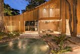 Exterior, Curved RoofLine, Tile Roof Material, Beach House Building Type, Glass Siding Material, and Wood Siding Material  Photo 7 of 16 in Al Suave House by Cincopatasalgato