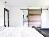 Custom sliding barn door we designed for our master bedroom. The door is a combination of douglas fir, cedar, and pine.