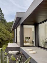 Covered and open porches connect the interior and landscape.