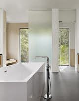 The minimalist interior complements the textures of the landscape