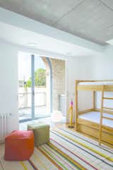 Ceiling Lighting, Light Hardwood Floor, Bunks, and Kids Room  Photo 17 of 29 in Inside House by Habitan Architects