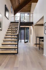 Staircase, Wood Tread, and Metal Railing House of Sound and Light - Stair and Entry  Photo 2 of 16 in House of Sound and Light by DeForest Architects