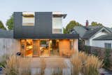 Nestled in Seattle's East Capitol Hill neighborhood, this modern residence "is an economical, efficient, low-maintenance, and modern version of a traditional Seattle house—one with primary living spaces on the main floor and three bedrooms above," state the architects.&nbsp;