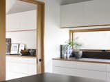 Kitchen, White Cabinet, and Wood Counter  Photo 5 of 17 in Lake Washington Overlook by SHED Architecture & Design