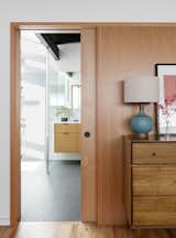 Bedroom, Dresser, Medium Hardwood Floor, Table Lighting, and Lamps  Photo 10 of 17 in Lake Washington Overlook by SHED Architecture & Design