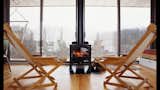 Living Room, Chair, and Wood Burning Fireplace  Photo 4 of 6 in Arado weeHouse by Alchemy Architects