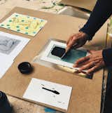 Testing different silk-screen printing options. After a short introduction to Girard's textiles in the exhibition “Alexander Girard: A Designer's Universe” participants design their own motifs for printing in this afternoon-long workshop. Using various textile printing methods, including thermal screen printing, participants create their own fabric prints for pillowcases, table cloths, cloth napkins, and other home textiles. 
