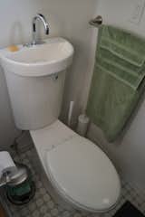 Marc and Jeanine's Tiny House toilet/sink only uses water when flushed. 