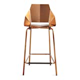 A copper-plated finish coats this counter stool by Blu Dot, which ships flat and folds along laser-cut lines to create a dynamic chair.&nbsp;