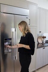 The Signature Kitchen Suite 42” Built-In Side-By-Side Refrigerator boasts an impressive capacity due to a SmartSpace™ system that embeds the ice dispenser in the freezer door.