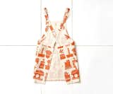 Skinny laMinx Apron, Orange Succulents
Seasonal Collection

Size: 33.5" W x 26.5" H

A lovely complement to our summer seasonal collection, you’ll find yourself reaching for this charming pinafore-style apron from Skinny laMinx—in the kitchen or studio. Adorned with a playful pattern of succulents, the cross-back pinny slips on over the head to fit people of all shapes and sizes, and the two patch pockets in front help keep hands free. The fabric is screen-printed using water-based ink on a pure cotton basecloth. We recommend hand washing in cold water, using a mild detergent, and drying on the line (don’t tumble). Made in Cape Town, South Africa.

Shop the collection here:
http://www.heathceramics.com/skinny-laminx-apron-orange-succulents

#heath #heathceramics #skinny #laminx #apron #orange #succulents 
