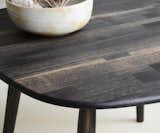 Expert craftsmanship is evident in the details of this patchwork tabletop, shown here in Oxidized Oak. With a sleek, simple shape, it’s designed to let the beauty and variety available from a single wood species take center stage.