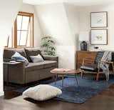 A clean silhouette and innovative functionality make our Allston Day & Night Sleeper sofa a modern solution for this space. Perfect for small spaces, Allston neatly tucks in the corner of this room.