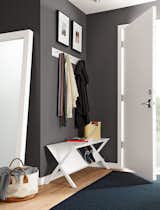 Modern wall hooks keep this entryway looking clean, organized and able to blend in with the rest of the home. #madeinamerica #organization 