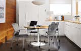 Simple and elegant, our mid-century-inspired Aria dining table is handmade in Wisconsin. The pedestal is crafted from one piece of spun steel, so there are no seams or joints to spoil the look. #furniture #office #madeinamerica 
