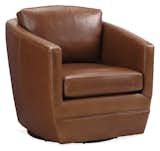 A leather accent chair that looks right at home in any space, Ford works equally well to fit people of every size. The swivel base, low seat and sloping arms envelop you in comfort. With a loose seat and comfortable back cushions, Ford is warm and inviting.