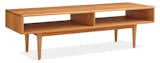 Mid-century details like solid wood turned and tapered legs and beveled edges lend an air of refinment to the Grove cocktail table. Handcrafted by Pennsylvania woodworkers, Grove features an oil-and-wax finish that enhances the natural grain pattern of its solid wood construction. #furniture #madeinamerica 