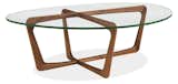 Clean lines combined with an organic form lend a softly modern, timeless feel to the Dunn cocktail table. Created by skilled Vermont artisans, Dunn features unique joinery that gives the base the illusion of being carved from a single piece of wood. A glass top showcases the distinctive base. #furniture #madeinamerica 
