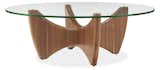 Our Fuller cocktail table's sculptural shape is inspired by mid-century designs. Thick slabs of wood are carved by master woodworkers into fluid shapes with rounded bull-nose edges, giving Fuller a stunning silhouette. #furniture #madeinamerica 