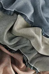 Our Zander throw provides lightweight warmth thanks to a blend of cotton and Tencel® made by an American fabric mill.