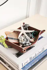 Crafted in Connecticut, our Brando valet tray is made of domestic, top-grain leather stitched with cobalt blue thread for a unique pop of color. 