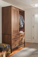 The Linear armoire offers all the beauty and function of large-scale storage within a unique, efficient design. You can detach the top cabinet from the bottom, making it easy to move or fit anywhere in your home.
