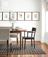 The petite size of our Doyle chair makes it ideal for smaller spaces or extra seating needs, but the stately silhouette means it looks right at home in a formal dining room.
