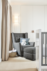 
The Wren glider offers incredible comfort and functionality. Its modern, high wingback design features a soft curve that offers the perfect place to rest your head as you snuggle with your little one. 