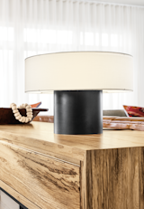 We designed our Clement lamp with a petite size and unique silhouette to add sculptural interest to any room. 