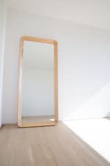 Six foot tall freestanding or wall-hanging mirror with solid, domestic Ash frame.
kalonstudios.com/shop/simple-mirror/  Photo 6 of 6 in Simple Collection by Kalon Studios