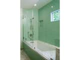 Modwalls Lush 3x6 glass subway tile in Surf pale green.
By Alison Designs. Photo by Brittney Krasts.