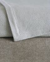 AREA Inc. HARRY almond, 100% brushed super-soft cotton blanket, made in Portugal. Classic chevron pattern in a nutty brown.