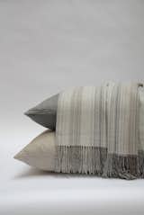 AREA Inc. JACK, neutral. 100% baby alpaca throws and blankets with irregular stripes of natural, brown, black, charcoal and soft grey.