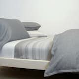 AREA Inc. 100% linen EMILE charcoal paired with baby alpaca blanket JACK neutral.