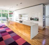  Photo 12 of 26 in Kitchen by Anne Mahler from Plum Modern Pendant Lighting Adds Pop of Color in Canadian Kitchen