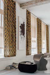 Ripple Fold Drapes in material Doni, color Espresso. Shown over Chilewich Solar Shades in Bamboo, color Oat.
