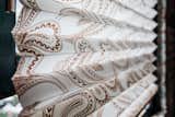 Pleated Shades shown in material Paisley Pleat, color Beige.