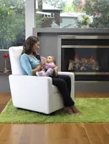 Modern upholstered Grano glider in white bonded leather by Monte Design