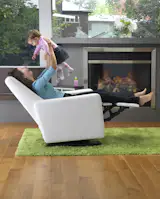 Modern upholstered Grano glider in white bonded leather by Monte Design