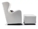 Modern upholstered Vola Glider and ottoman in white by Monte Design with a Paul Smith fabric pillow