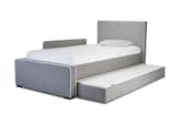 Modern upholstered Dorma twin bed in heather grey body with white piping, guard rails, and bed trundle by Monte Design 