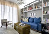 Living Room, Chair, Sofa, Coffee Tables, Bookcase, End Tables, and Ottomans Lounge  Photo 11 of 22 in Skylight House by dSPACE Studio